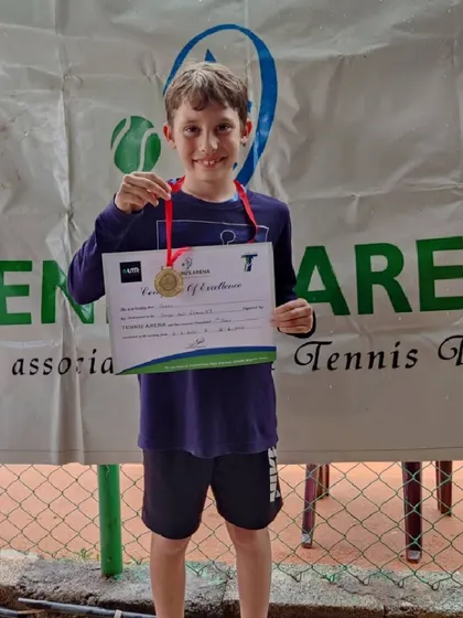 Hard work pays off. Another one of our dedicated students with his medal and certificate, marking his achievement in the tournament.