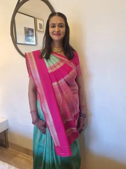 A simple and elegant look for a family function. The makeup is soft and natural, perfect for the occasion.