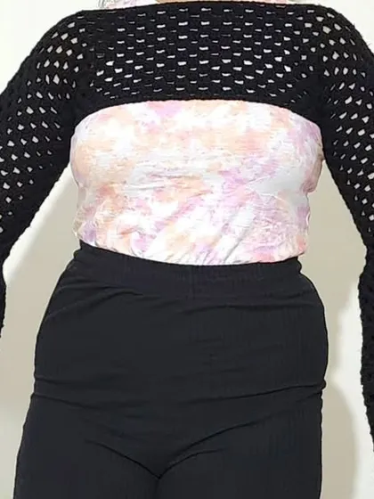 This is my Retro Shrug, a simple yet dramatic piece with extra-long bell sleeves. It's perfect for adding a touch of gothic or boho flair to an outfit.