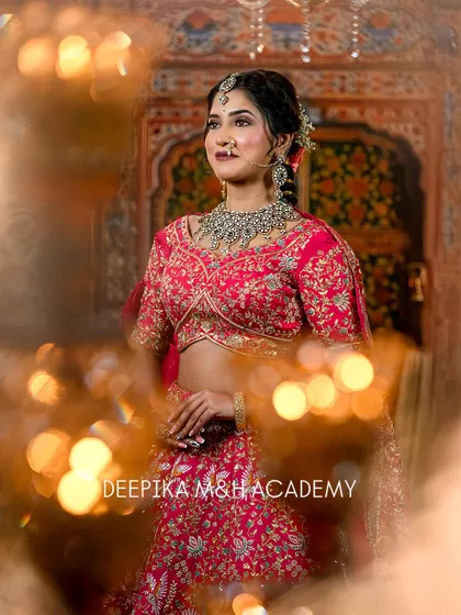A creative shot of the bride through a bokeh of lights, adding a magical feel to the portrait. Her smile and sparkling jewelry are the focus.