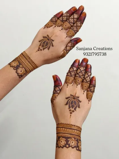 Both hands showcasing the beautiful symmetry and rich stain of this elegant design.