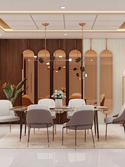 This open-layout dining room is designed for shared living experiences. The rose-gold tinted mirrors and wood paneling create a warm and sophisticated atmosphere, while the comfortable seating invites long, lingering meals.
