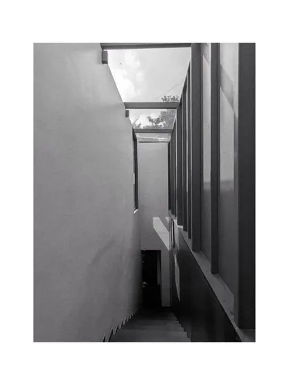 Light and shadow play in a stairwell at our studio. We believe in creating inspiring spaces, and our own office is a laboratory for these ideas.