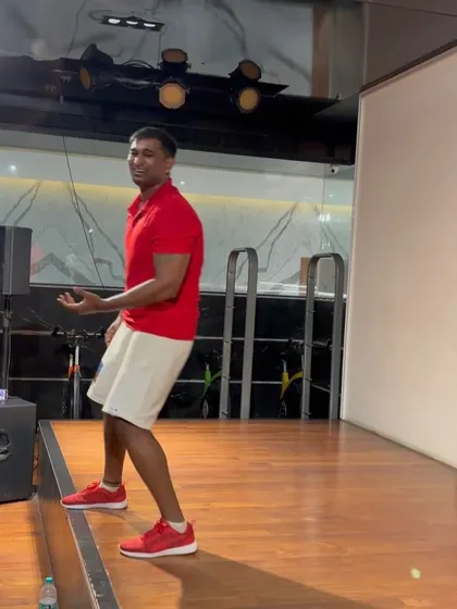 A side view of me leading the dance session on stage.