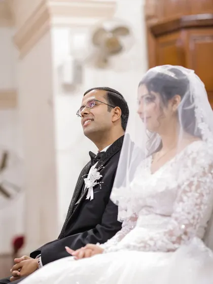 A candid shot of the couple during their church ceremony at the Taj Mahal Hotel, New Delhi.