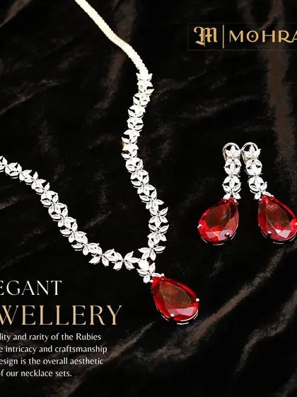An elegant diamond necklace with a large teardrop ruby pendant. The quality of the rubies and the craftsmanship make this a truly special piece.