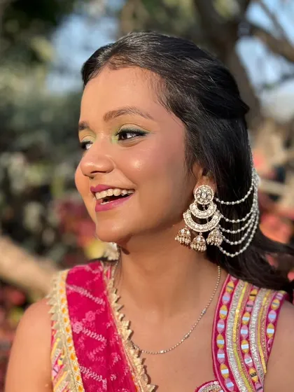 The final look is fresh, fun, and perfect for a vibrant Mehendi party.