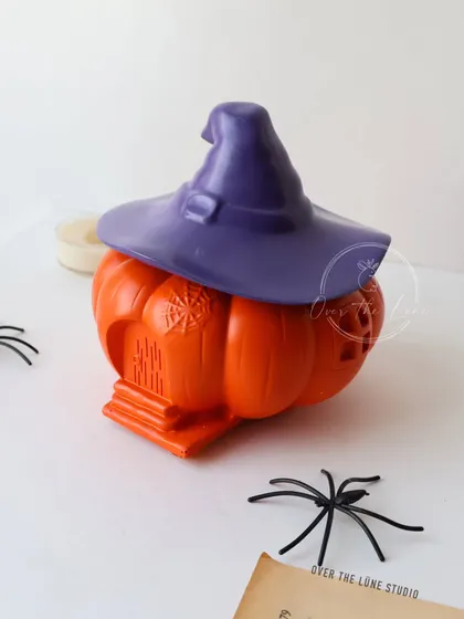 Another angle of the Witch House Pumpkin Jar, a unique piece for your autumn and Halloween decor.