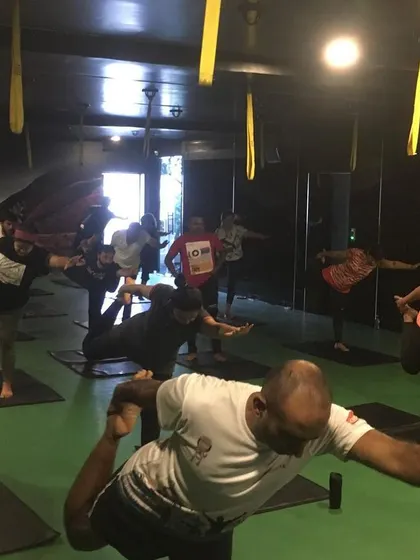 The energy of a group class is truly special. Here, students are practicing Natarajasana, the Lord of the Dance Pose, at my Basavanagudi studio. We focus on building balance and concentration together, creating a supportive environment where everyone can challenge themselves.