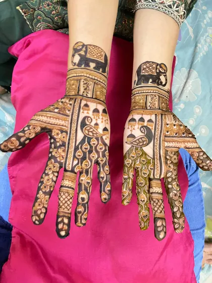 Short-length design with peacocks and elephants.