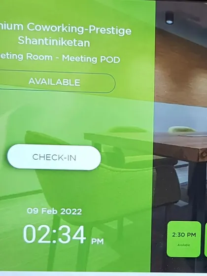 A closer look at the meeting pod's digital scheduling screen. This system provides real-time data on room usage, which helps office managers make smarter decisions about their space.