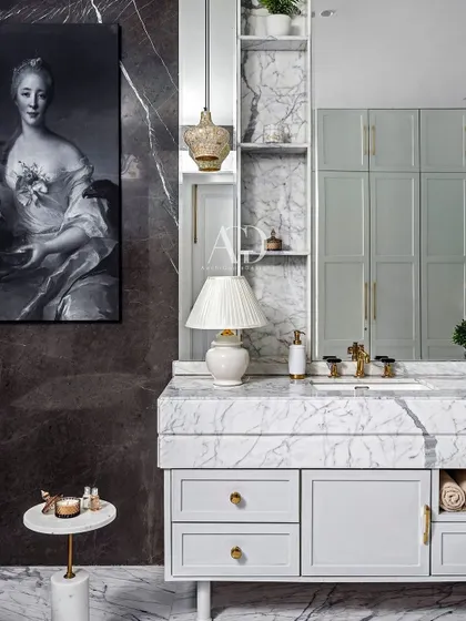 Every detail in this space was thoughtfully curated to create a harmonious blend of functionality and aesthetics. The design incorporates the client's love for monotones, with shades of grey and white creating a chic and stylish bathroom.