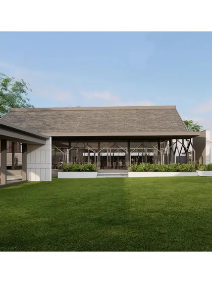 The dining hall of the Hoodi Convention Center is enclosed in glass, creating the experience of dining within a garden. The exposed structural frame adds an industrial yet elegant character to the space.