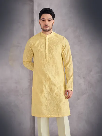 Simplicity and elegance in our pastel yellow kurta. The clean lines and soft color make it a versatile and timeless addition to any man's collection.