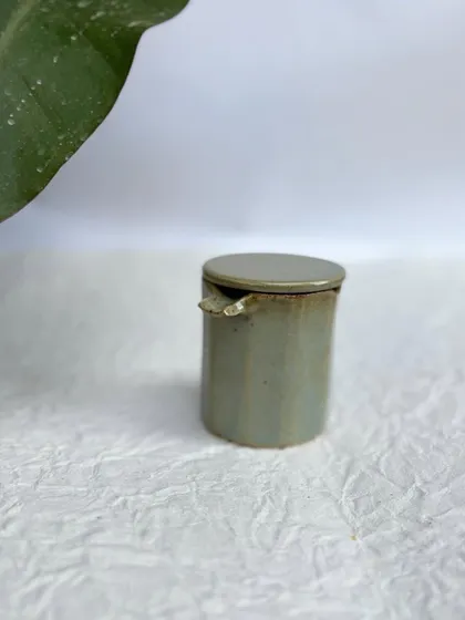 The Party Ashtray with its lid on. It's a sleek, contained design.