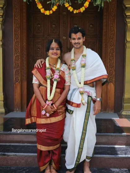 I draped this bride in a traditional Madisar style, which is a 9-yard saree drape specific to Tamil Brahmin weddings. We achieved this intricate look in just 10 minutes during a quick change for her muhurtham ceremony.