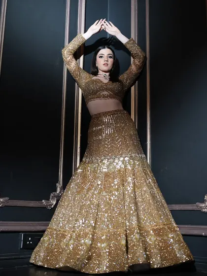 A high-fashion pose showcasing the full outfit and the dramatic makeup. This is where artistry and fashion meet.