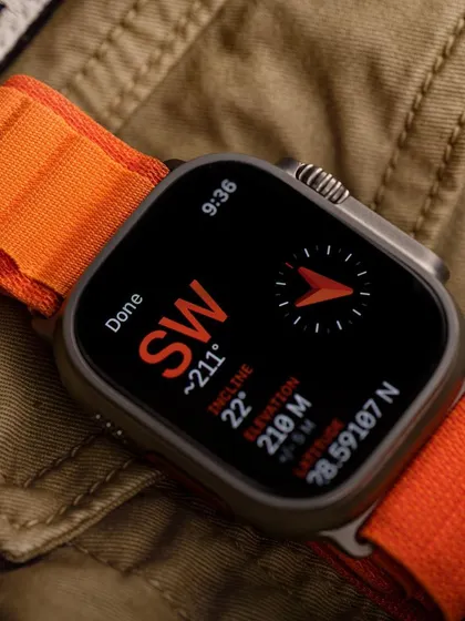 A close-up of the Apple Watch Ultra, showing the detailed metrics on the screen. This highlights the watch's advanced features for tech-savvy customers.