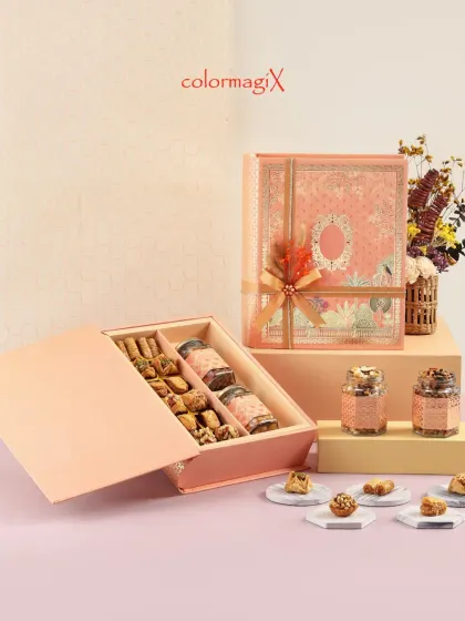 Our Diwali Book Box Hamper is a unique and elegant gifting solution. Designed to look like a classic book, it opens to reveal a selection of gourmet treats and snacks.