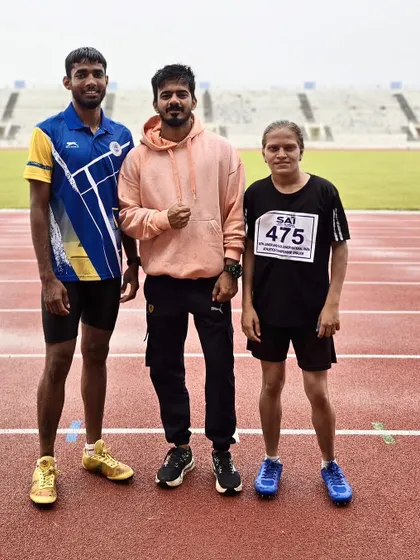 Two of our para-athletes, Mohit and Soumya, with their coach on the track. Their combined efforts resulted in multiple medals for the academy.