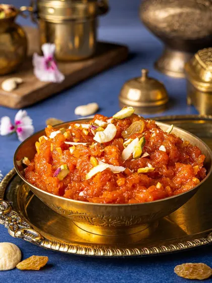 Another shot of the Gajar Halwa, focusing on the rich texture and garnish of nuts and raisins.
