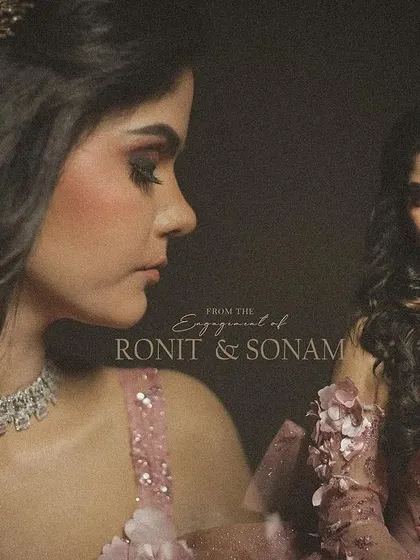 A dramatic and elegant portrait of the bride-to-be from her engagement. The dark background and soft lighting focus all the attention on her profile, makeup, and beautiful jewelry.