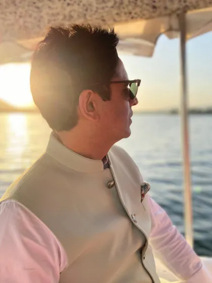 A candid shot looking out at the sunset over a lake. These moments of natural beauty are a huge source of inspiration.