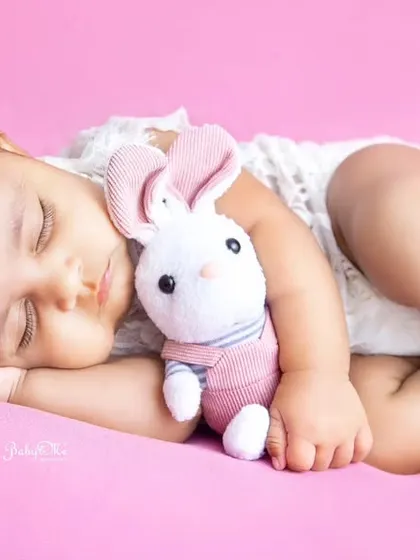 Another angle of this precious moment, showing her sweet profile as she sleeps. I love capturing multiple shots to give parents a variety of beautiful memories.
