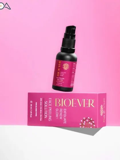 A bold and graphic product shot of a face peeling solution, using a vibrant pink background and strong angles to create a striking image.