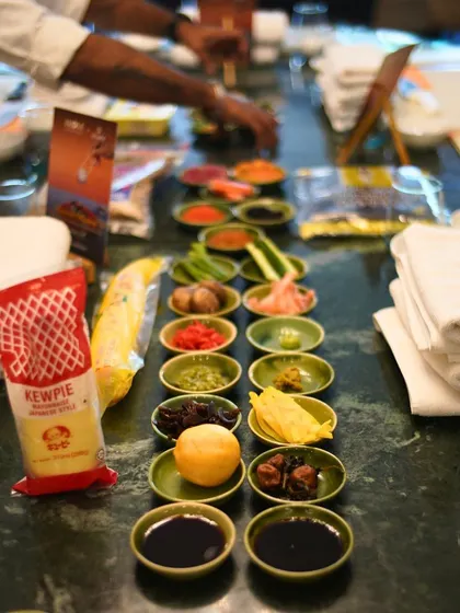 A colorful spread of fresh ingredients ready for our sushi making experience. We provide everything you need, from Kewpie mayo to pickled ginger, to create authentic flavors.