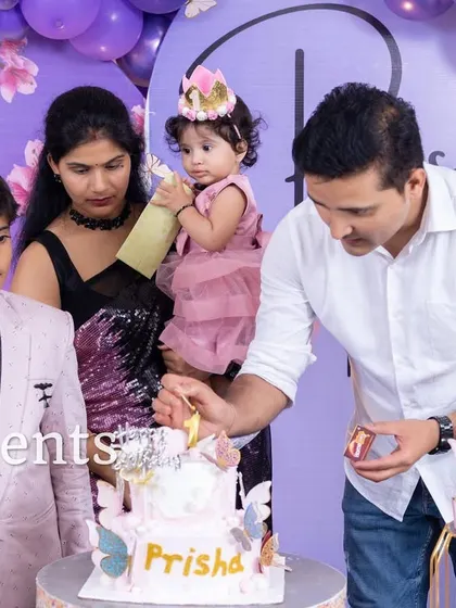 Lighting the first birthday candle is a special memory.