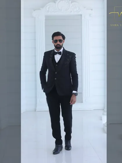 For the groom who appreciates classic style. This sharp black tuxedo is a timeless choice for a reception or cocktail event. It's a perfect example of the premium groom's wear you can find in my collection, available for sale at an amazing price.
