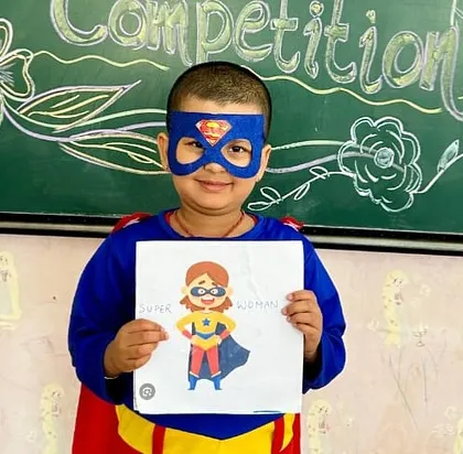 Dressed as a superhero, this young student shared a story of courage and helping others, embodying the values we encourage.
