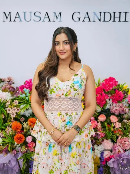 A snapshot from the first day at the academy, surrounded by flowers and ready to teach.