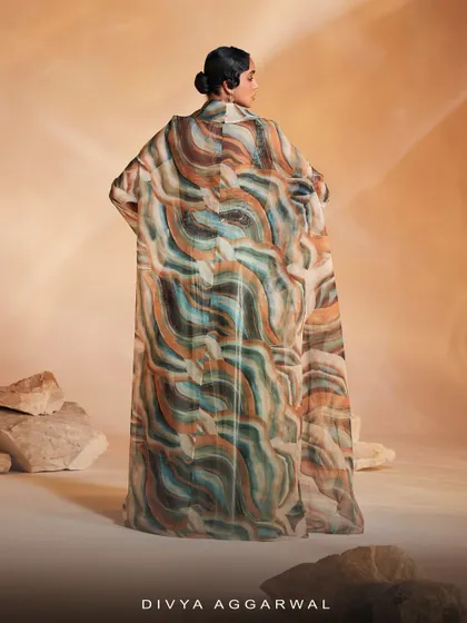 The back view of the Adoree Cape Set, highlighting the full expanse of the alluring printed organza cape.