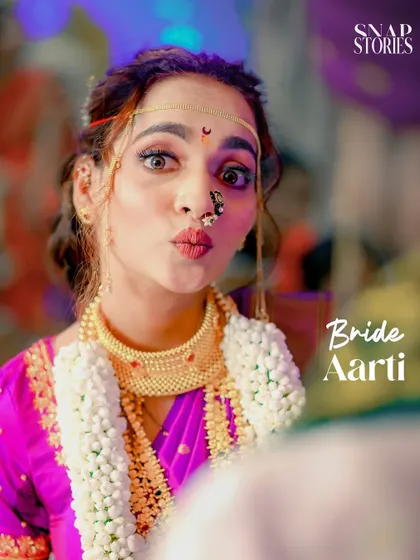 A fun, candid shot of the bride making a playful expression. We love capturing the lighthearted and personal moments that make your wedding unique.