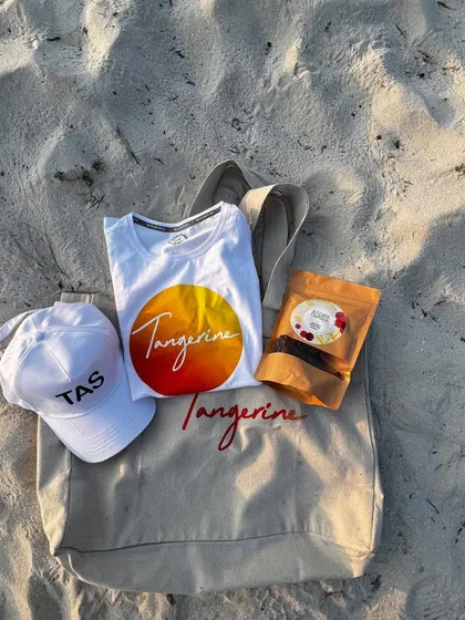 A little something to remember us by. Our signature Tangerine goodie bags are a retreat ritual, filled with thoughtful gifts for our community.