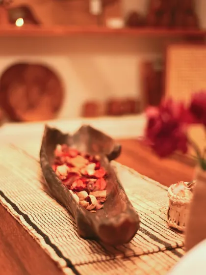 Another look at the decorative wooden bowl, a perfect example of functional art. Each bowl is unique, carved to follow the natural contours of the wood.