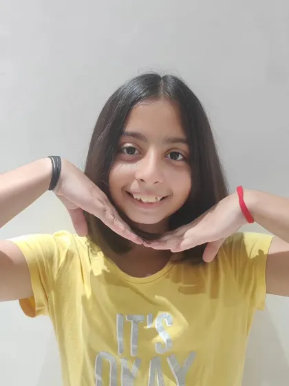 Let the cuteness shine through. A simple, shoulder-length haircut for a happy young client.