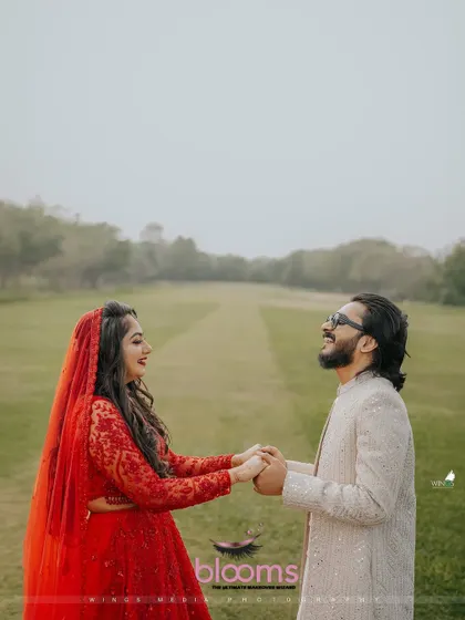 A joyful moment captured perfectly. The groom's relaxed yet polished look was ideal for this romantic pre-wedding shoot.