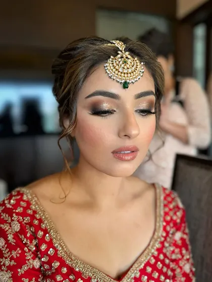 The focus here was on creating a flawless canvas. Jasmeet's skin is prepped to perfection for a radiant, long-lasting glow, with a subtle contour to enhance her features under any light.