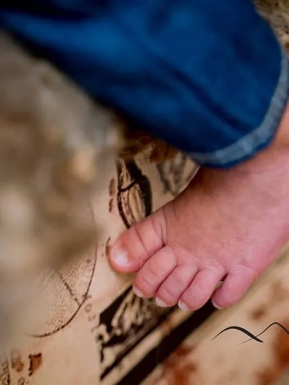 It's all in the details. We love capturing close-ups of those tiny feet, a perfect memory of how small they once were.