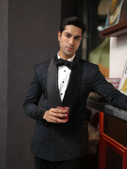 A closer look at the Labyrinth Tuxedo's unique texture and the classic satin shawl lapel.