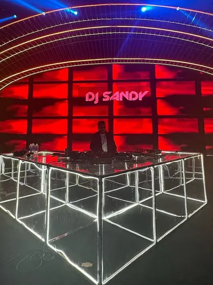 A look at my stage setup for a destination wedding in Vietnam. I use top-of-the-line equipment and work with event planners to create a visually stunning console and lighting design that matches the scale of the celebration.