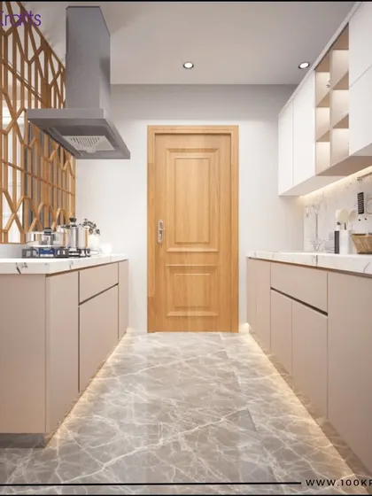 A contemporary galley kitchen with sleek beige cabinets and a geometric wooden partition. The under-cabinet lighting and marble-patterned flooring create a bright and elegant space.