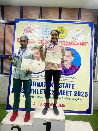 Two of our young athletes on the podium at the Karnataka State Athletics Meet, showing off their gold and silver medals. This is a testament to their hard work in the Under-16 category.