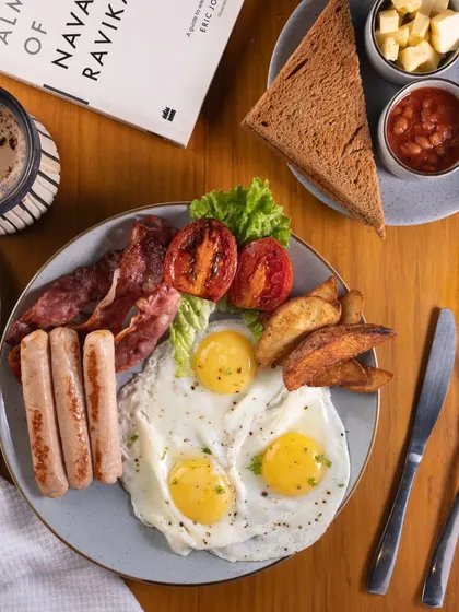 This is the quintessential "Full English" breakfast. I arranged all the elements, from the eggs to the sausages, to look abundant and perfectly cooked, making it the ultimate breakfast temptation.