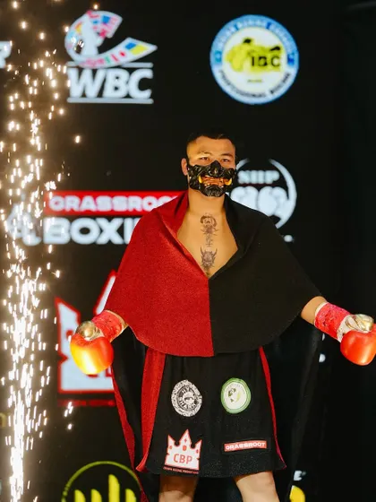 A fighter's entrance outfit, complete with a menacing mask. We encourage our fighters to build their brand and persona.