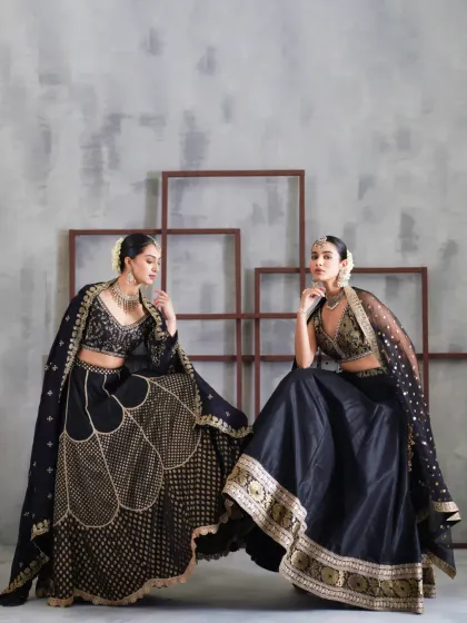 For the bride who dares to be different, these black lehengas offer a rich, evening-ready look. Finished with striking gold embellishments, they are perfect for a glamorous reception or cocktail event.
