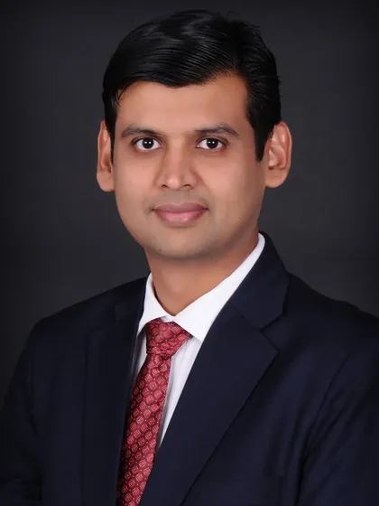 For a more formal and serious tone, I use a solid black backdrop. This style of business portrait photography adds a sense of authority and is excellent for executive bios, author photos, or any professional who wants a powerful image.
